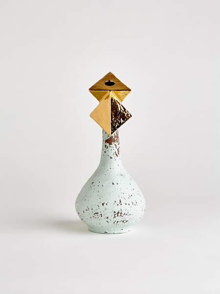 gold pyramid vase